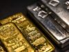 Gold and silver slide after record highs as profit-taking hits metals and markets