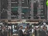Bitcoin holds above $80,000 as stocks sink and Treasury yields climb on hot inflation data